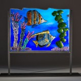 Stained glass panel with colorful tropical fish