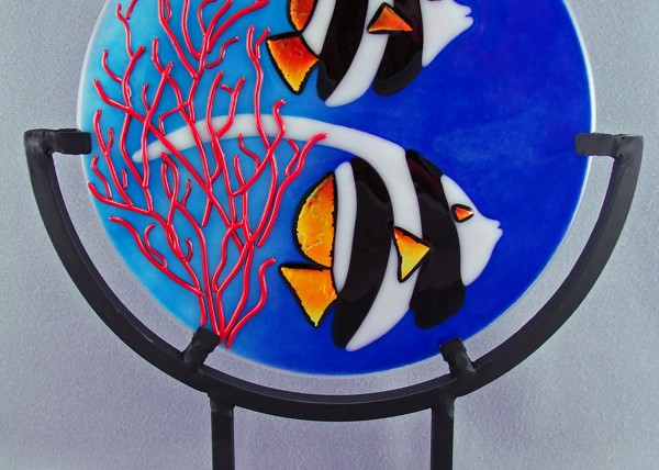 Round glass art plate with two tropical fish