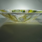 Translucent green and yellow glass bowl