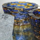 Stacked blue and amber fused glass bowls