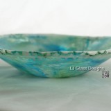 Shallow turquoise marbled glass bowl