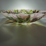Handblown decorative glass bowl with green swirls
